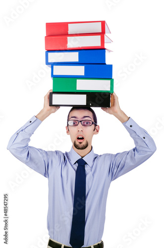 Photo: Businessman with lots of folders isolated on white Businessman with lots of folders isolated on white