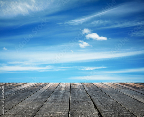 Photo: sunset sky and wood floor sunset sky and wood floor