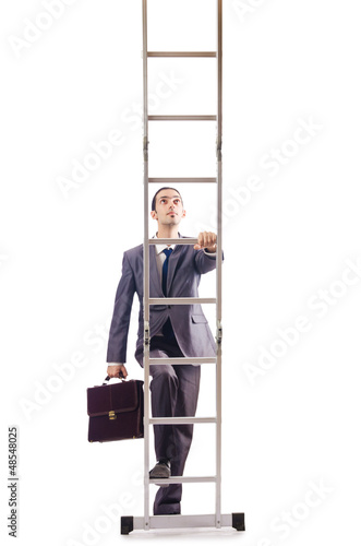 Photo: Businessman climbing the ladder isolated on white Businessman climbing the ladder isolated on white