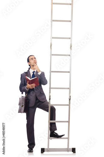 Photo: Businessman climbing the ladder isolated on white Businessman climbing the ladder isolated on white