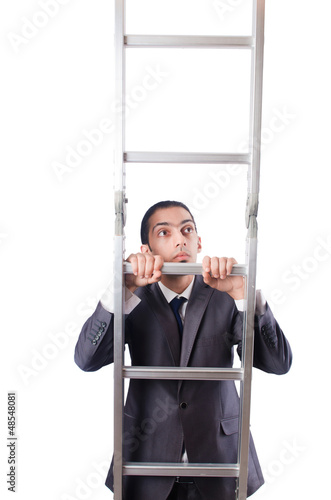 Photo: Businessman climbing the ladder isolated on white Businessman climbing the ladder isolated on white