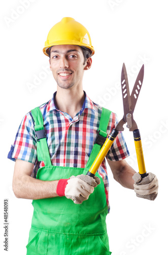 Photo: Man gardener with shears on white Man gardener with shears on white