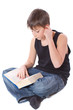 Photo: boy reading a book boy reading a book