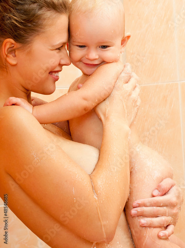 Photo: Mother and baby daughter in the shower Mother and baby daughter in the shower