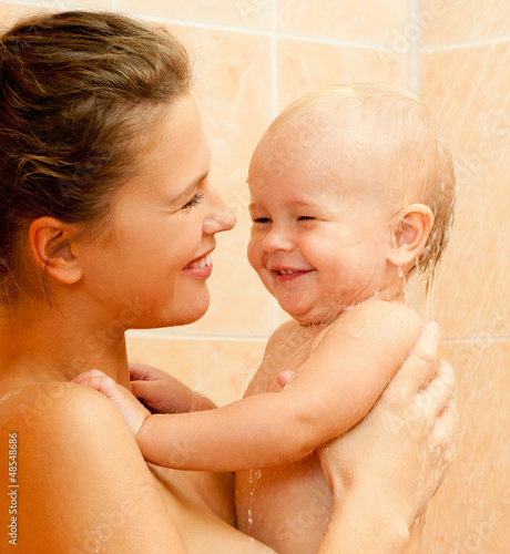 Photo: Mother and baby daughter in the shower Mother and baby daughter in the shower