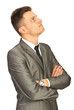 Confused business man looking up