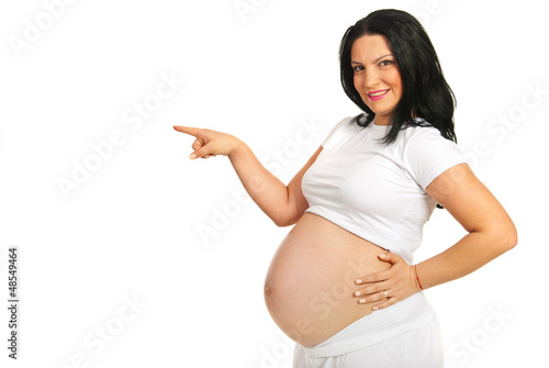 Photo: Pregnant woman pointing Pregnant woman pointing