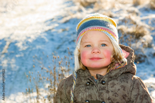 Photo: child in front of winter- background child in front of winter- background