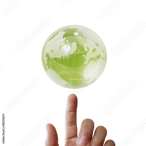 Photo: glowing earth globe in his hands glowing earth globe in his hands