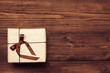 Vintage gift over wooden background