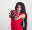 Foto: Attractive woman with valentine heart in his hands. Attractive woman with valentine heart in his hands.