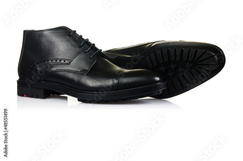 Photo: Fashion concept with male shoes on white Fashion concept with male shoes on white