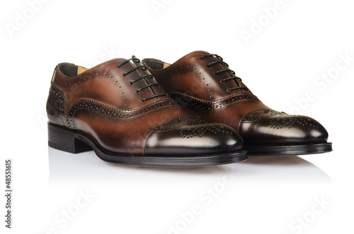 Photo: Fashion concept with male shoes on white Fashion concept with male shoes on white