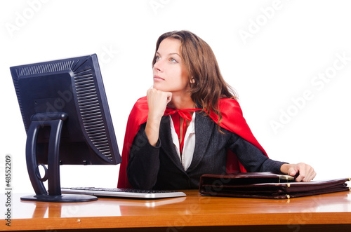 Photo: Superwoman worker working in office Superwoman worker working in office