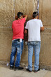 Jewish worshipers pray at the Wailing Wall. Jerusalem, Israel.