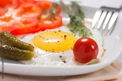 Photo: Fried eggs with salty vegetables and greens Fried eggs with salty vegetables and greens