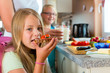 Foto: Family - mother making breakfast for school Family - mother making breakfast for school