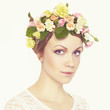 Photo: Beautiful young girl with flowers Beautiful young girl with flowers