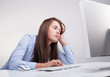Beautiful woman tired at work