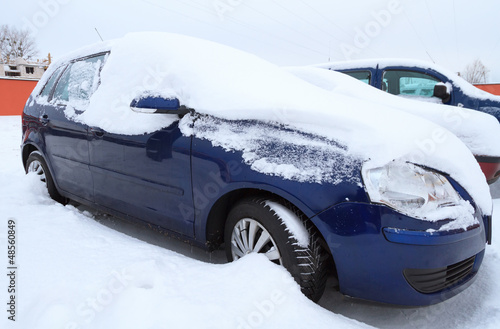Photo: Car covered by heavy snow in winter time Car covered by heavy snow in winter time