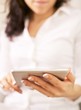 Photo: Office Secretary with a Handheld Device Office Secretary with a Handheld Device