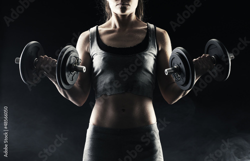 Photo: Lifting the dumbbells Lifting the dumbbells