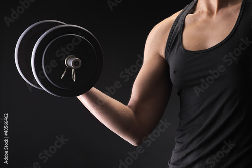 Photo: Lifting the dumbbells Lifting the dumbbells