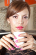Photo: happy brunette in cafe l happy brunette in cafe l