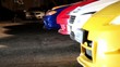 Video: Red automobile rides backward to row of several cars Red automobile rides backward to row of several cars