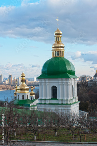 Photo: Monastery in Kiev under river Dnieper Monastery in Kiev under river Dnieper