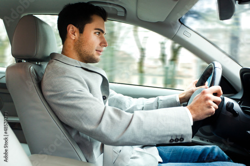 Photo: Man driving his car Man driving his car