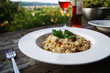 Risotto on rustical table outdoors