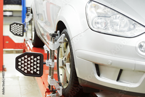 Photo: car at wheel alignment diagnostic tester car at wheel alignment diagnostic tester