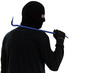thief burglar with metal crowbar