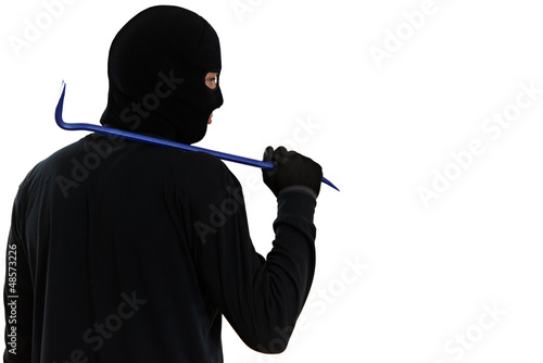 Photo: thief burglar with metal crowbar thief burglar with metal crowbar