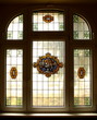 Big old window with beautiful colored murals