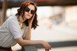 Fashion model wearing sunglasses outdoors closeup portrait