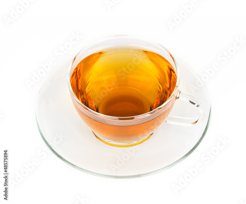 Photo: A cup of hot tea on white background A cup of hot tea on white background