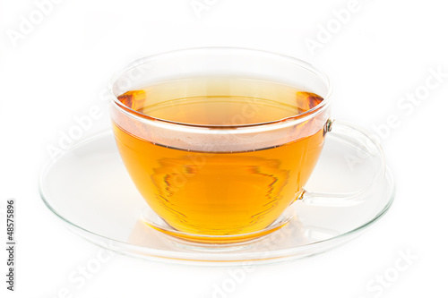 Photo: A cup of hot tea on white background A cup of hot tea on white background