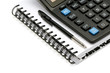 Notebook and calculator isolated on white background