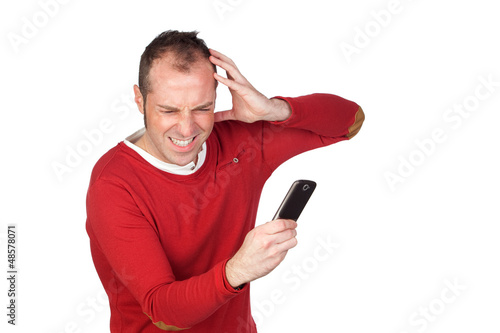 Photo: Young boy getting bad news by phone Young boy getting bad news by phone
