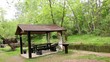 Three summerhouses ashore of small pond