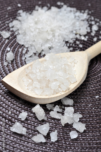Photo: Sea salt in a wooden spoon Sea salt in a wooden spoon