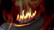 Tongues of flame go through slot in metal tube