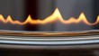 Tongues of flame at edge of metal plate