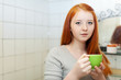 teenage girl gargling throat