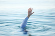 Hand of drowning man