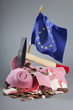Robbed piggy bank an EU flag