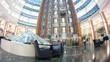 In hall of business-center go lifts upwards and downwards and go