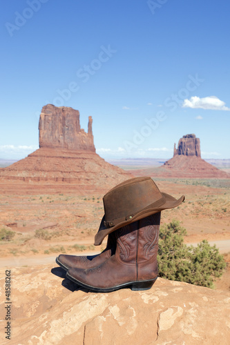 Photo: boots and hat at Monument Valley boots and hat at Monument Valley